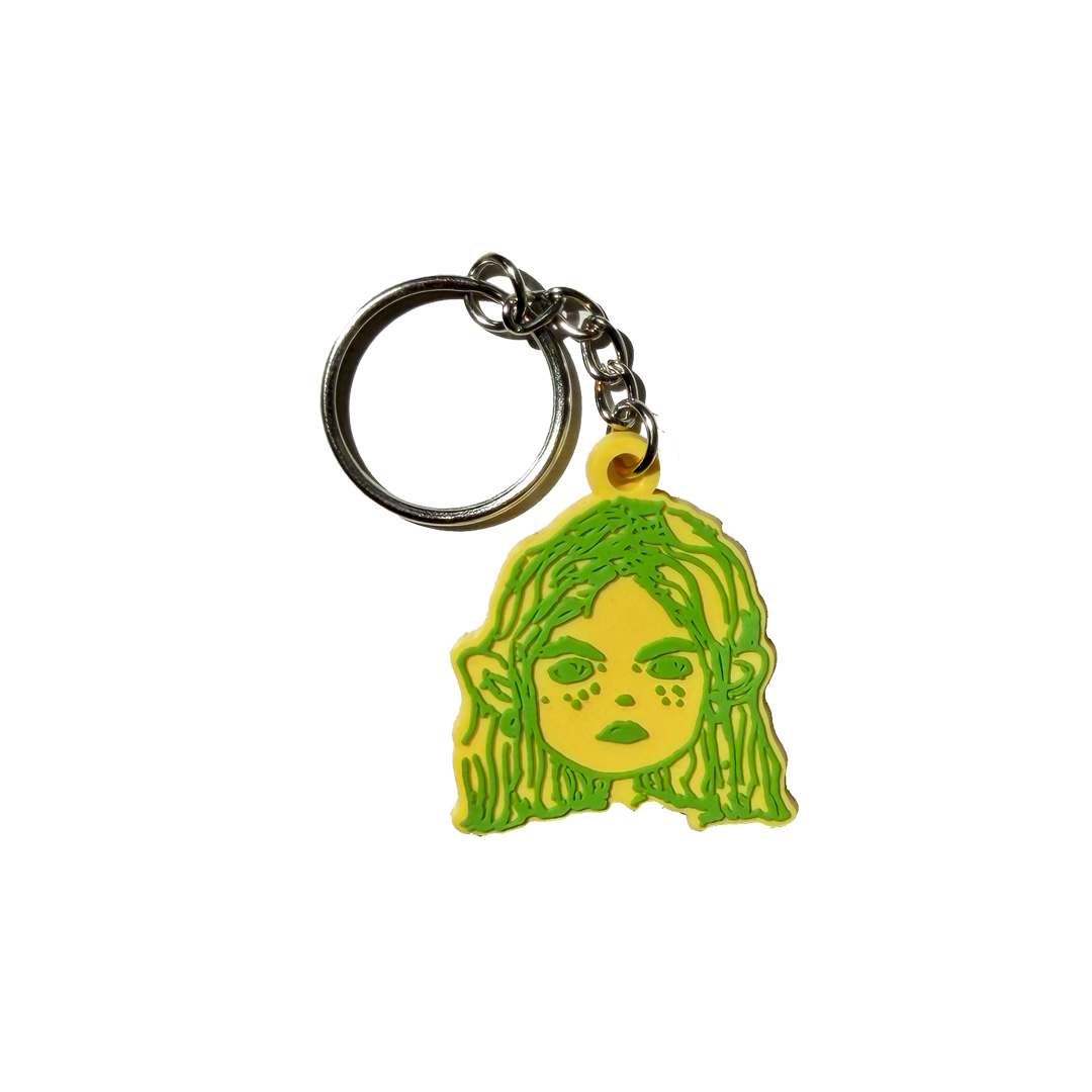 Green and yellow illustrated character keyring
